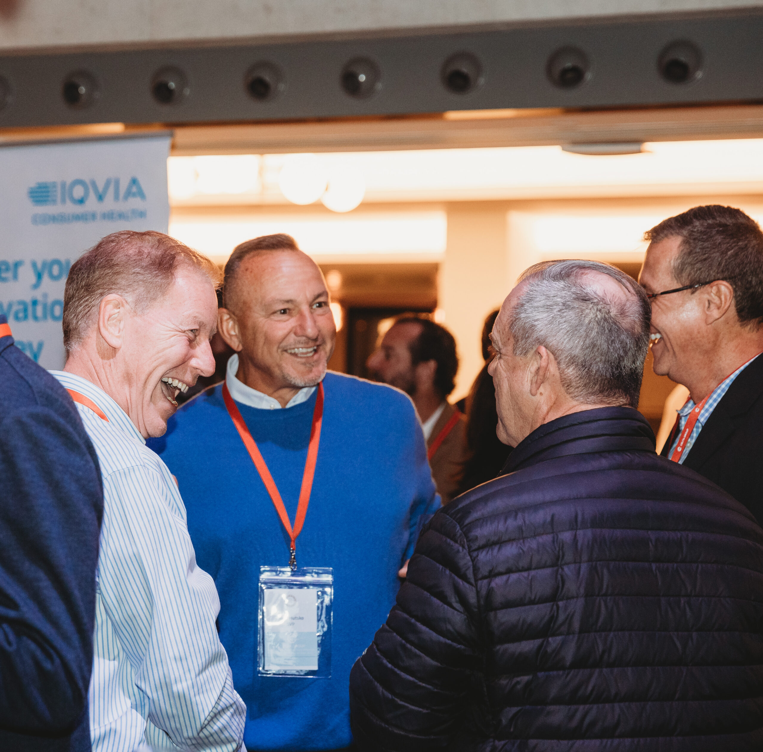 A group of professionals networking at the Ceuta International Conference