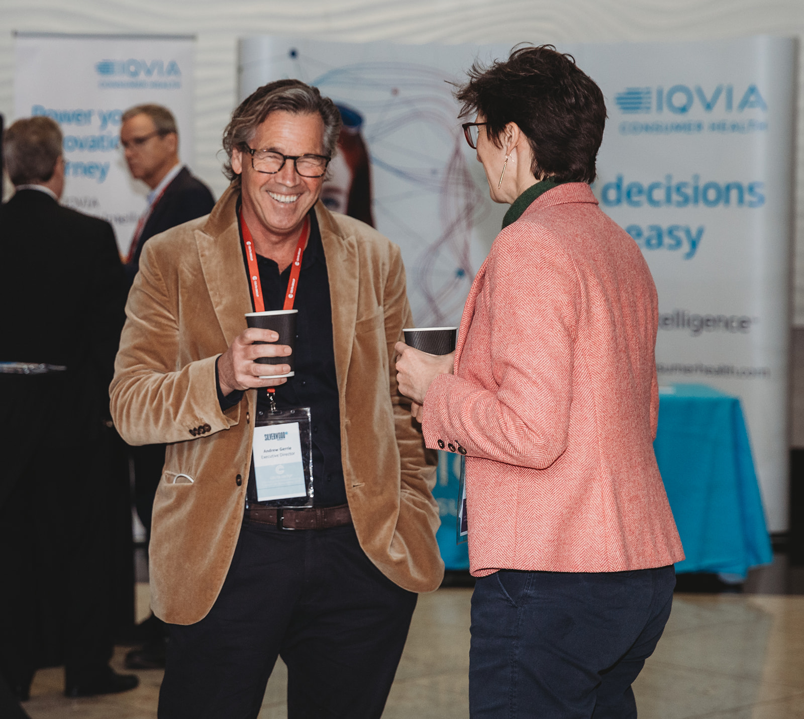 Two people in business attire networking at the Ceuta International Conference