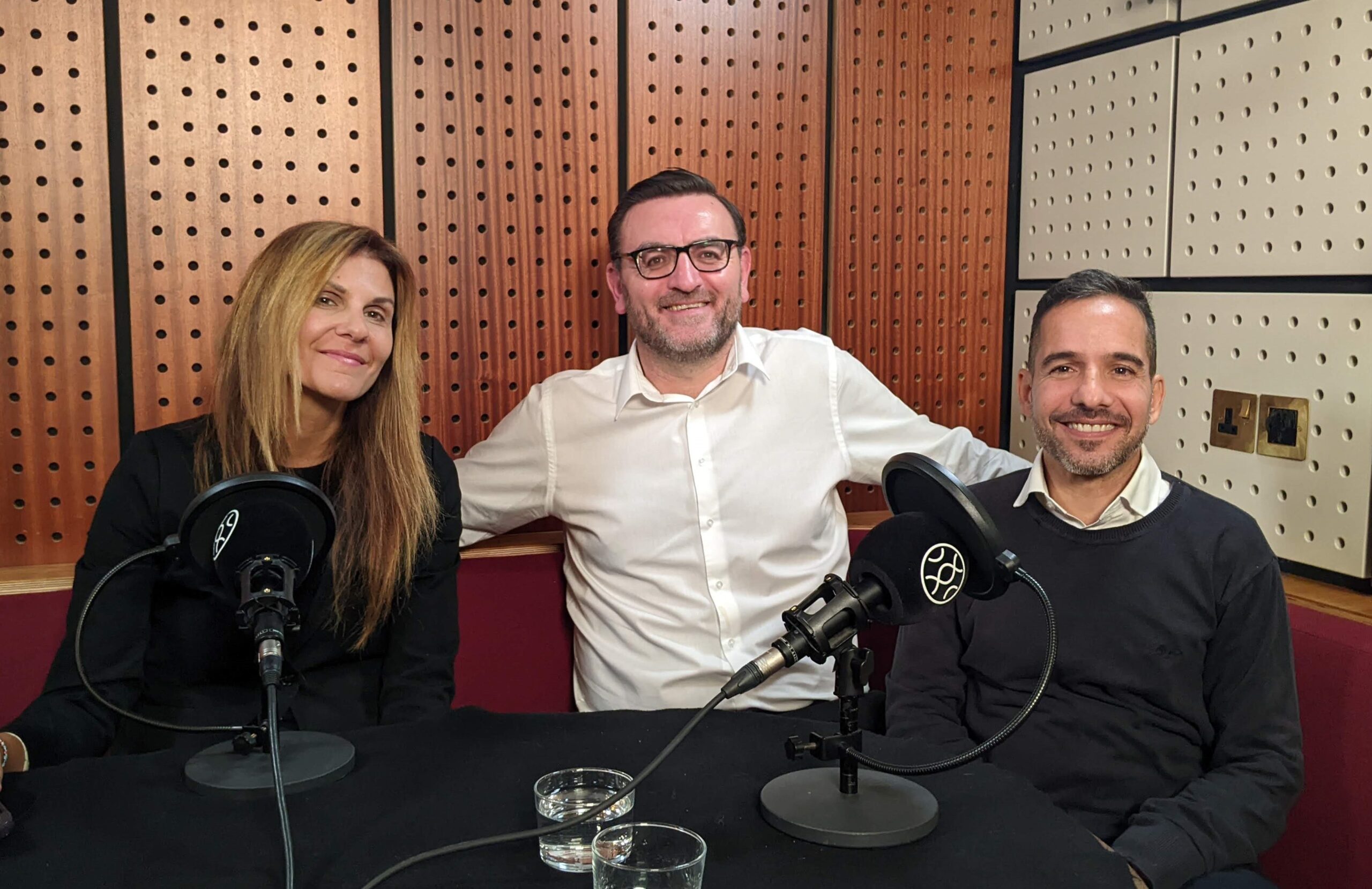 May Petracco, CFO at Foundation Consumer Healthcare, Sergio Correia, and Paul Widdop sit together in a podcast recording stusio smiling