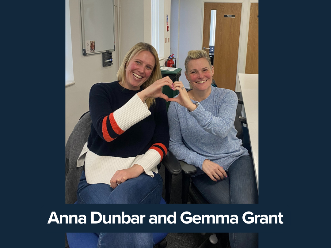 Anna Dunbar and Gemma Grant making a heart with their hands