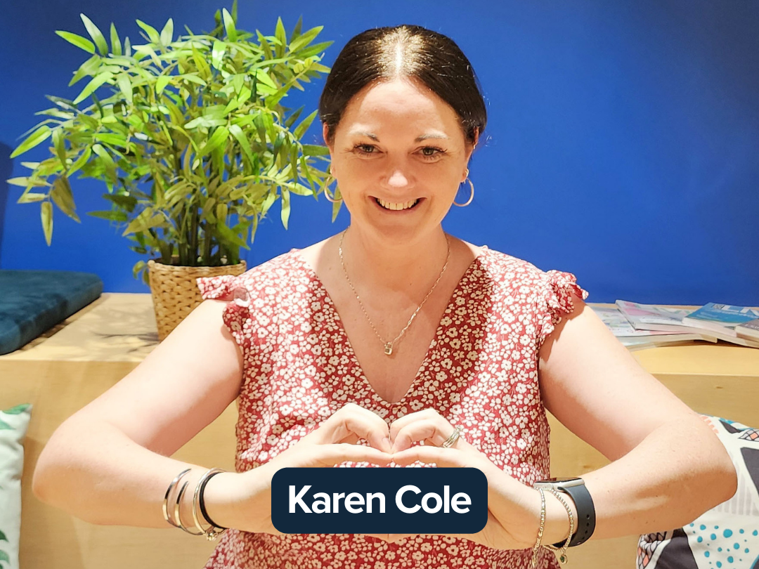 Karen Cole making a heart with her hands