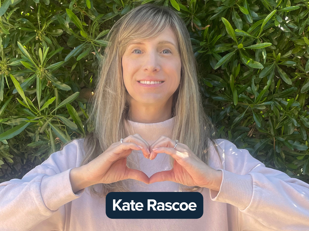 Kate Rascoe making a heart with her hands