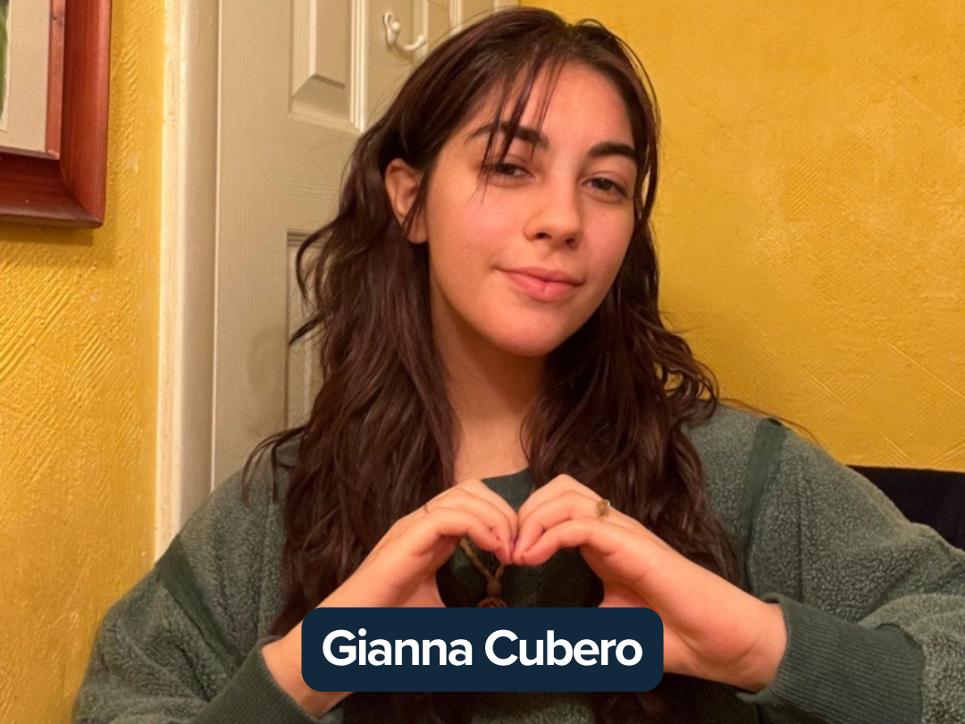 Gianna Cubero making a heart with her hands